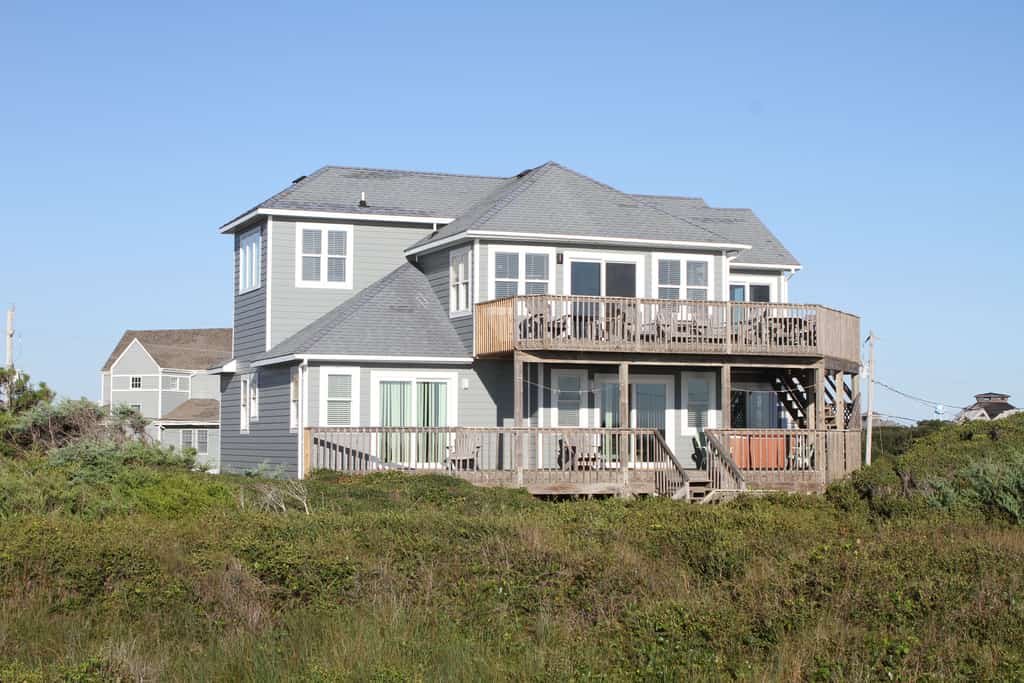 Oceanfront dog-friendly home close to sand with views & private hot tub