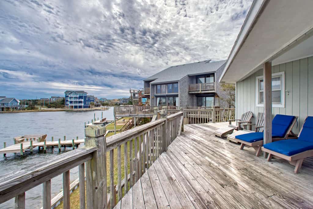 Sunny canal-front home w/deck, boat dock, private washer/dryer, & central AC