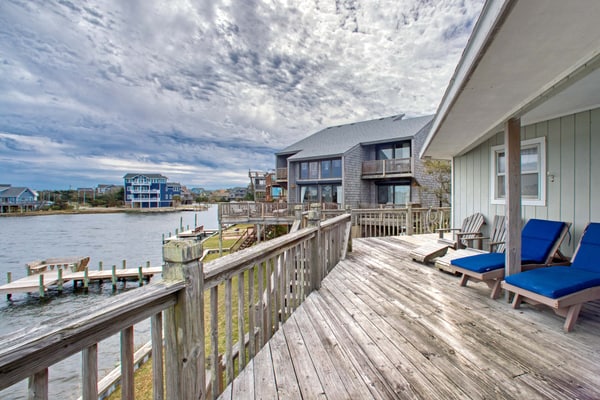 Sunny canal-front home w/deck, boat dock, private washer/dryer, & central AC