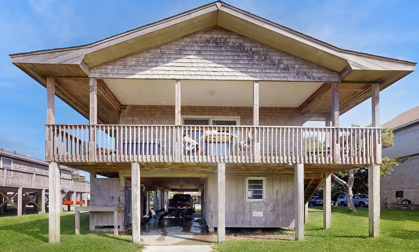 Dog-friendly, canal-front house with dock, balcony, deck, & central AC