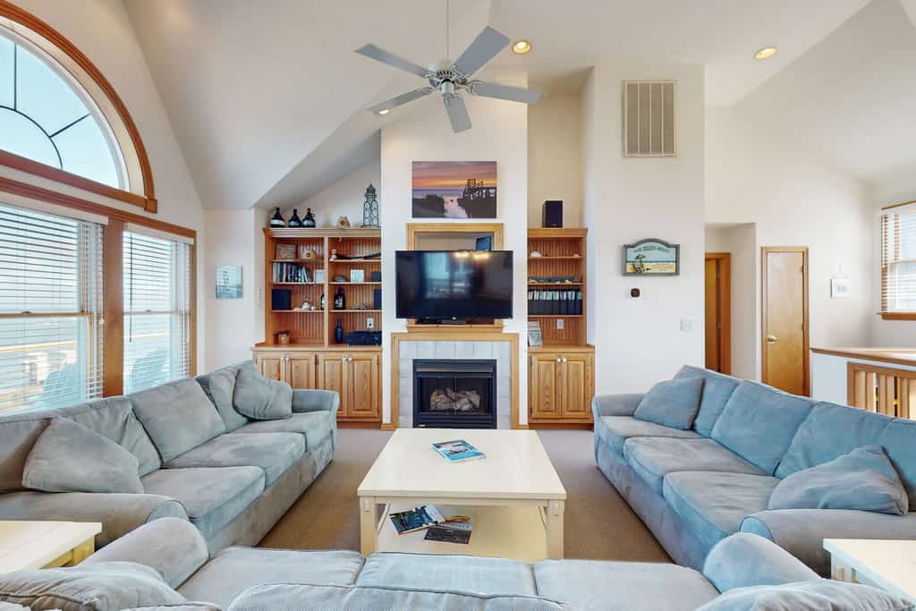 Waterfront home with private hot tub, sound access, fireplace & pool