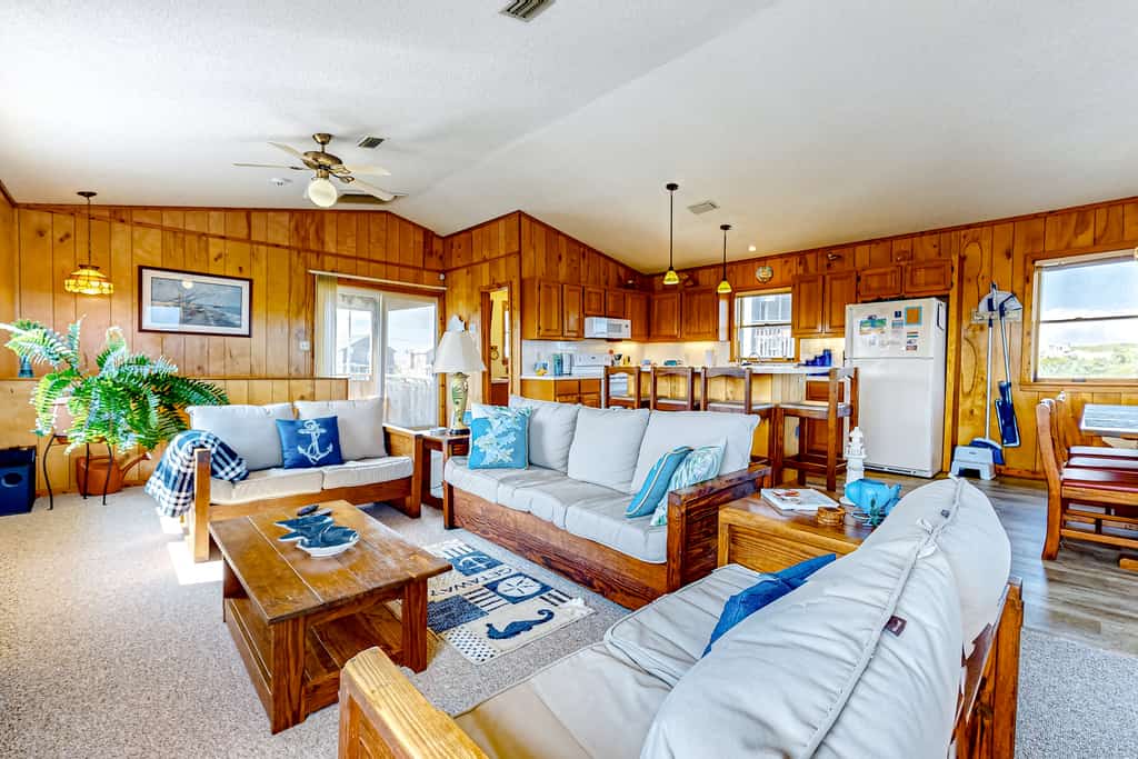 Charming water view home with pool access, decks & outdoor shower - dog-friendly
