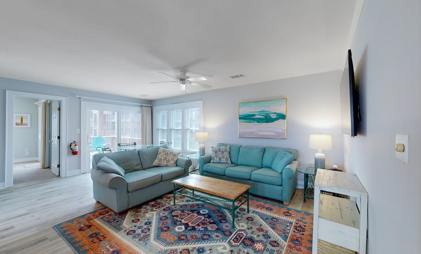 Beautifully updated condo with outdoor pool, beach access, AC & washer/dryer