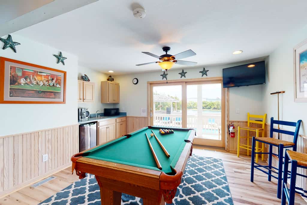 Waterfront home with theatre, private pool & hot tub - dog-friendly