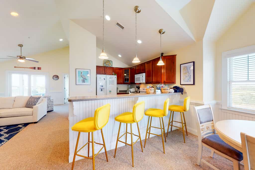 Waterfront condo with private washer/dryer, pool, water views, and free WiFi