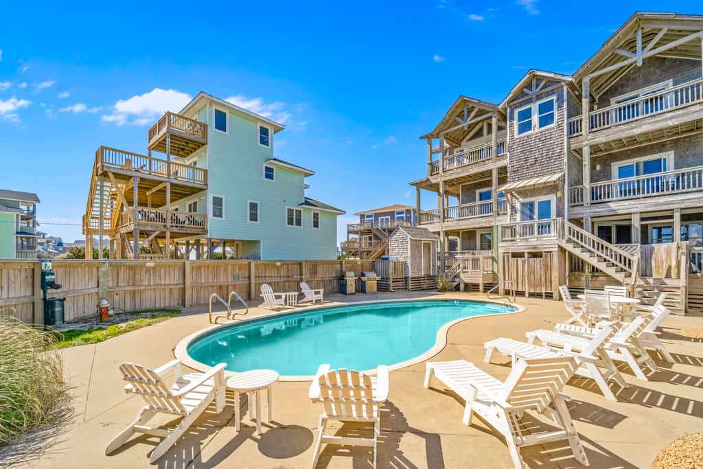 Sprawling & luxe home with pool, hot tub, balconies, grill, game room, & AC
