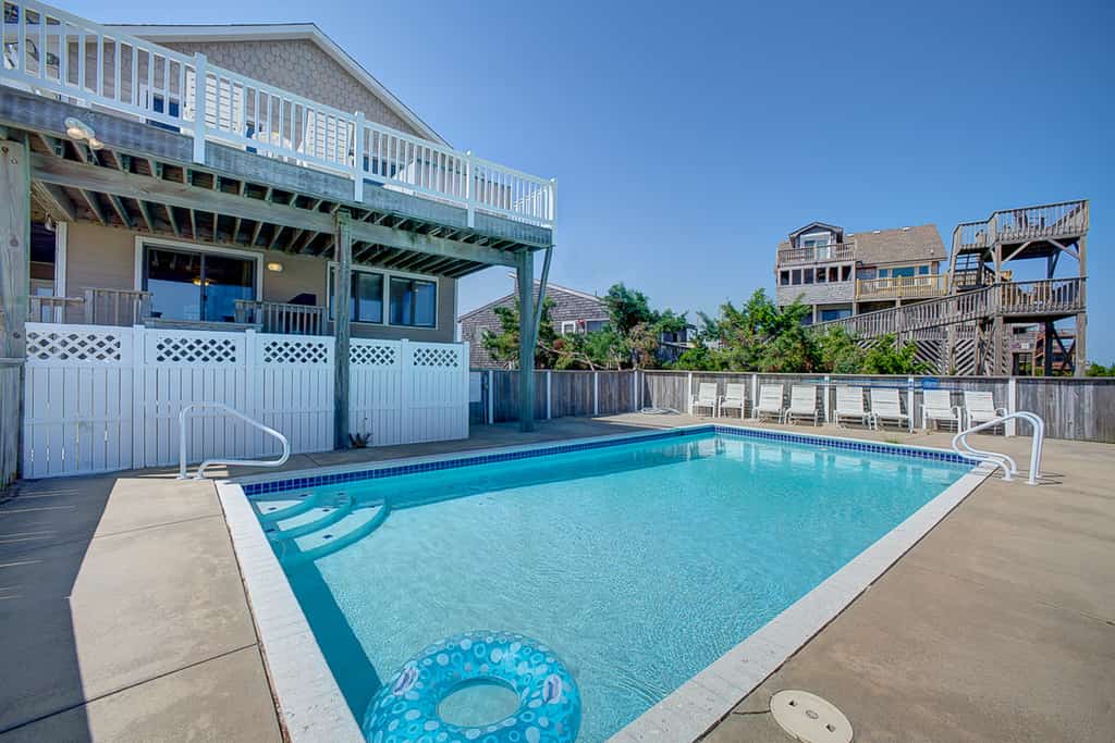 Luxury beach home with beach view, private hot tub, & fireplace