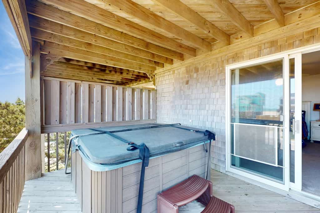 Ocean view home with private hot tub, ocean view, pool access, W/D, and WiFi