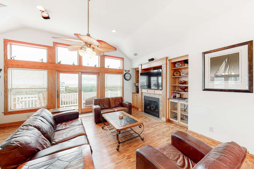 Water-view home with private pool, hot tub, game room, amazing decks, & elevator