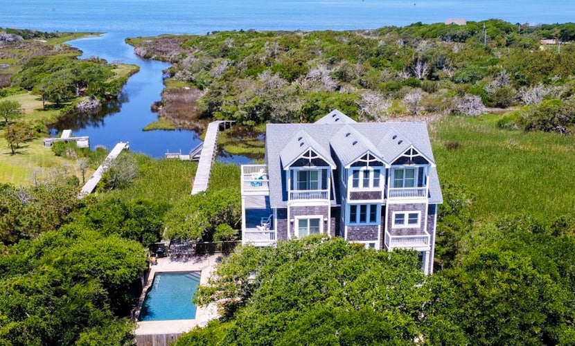 Waterfront home with ocean views, private pool & hot tub