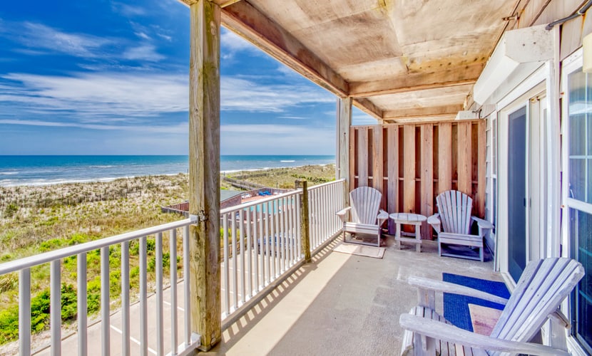 Second-floor oceanfront home with outdoor pool, hot tub, pool table, & W/D