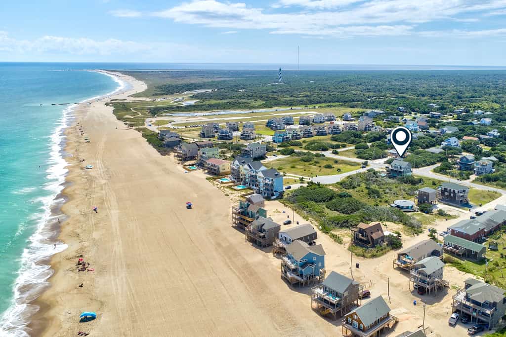 Towering beach house with private pool, hot tub, decks & ocean views