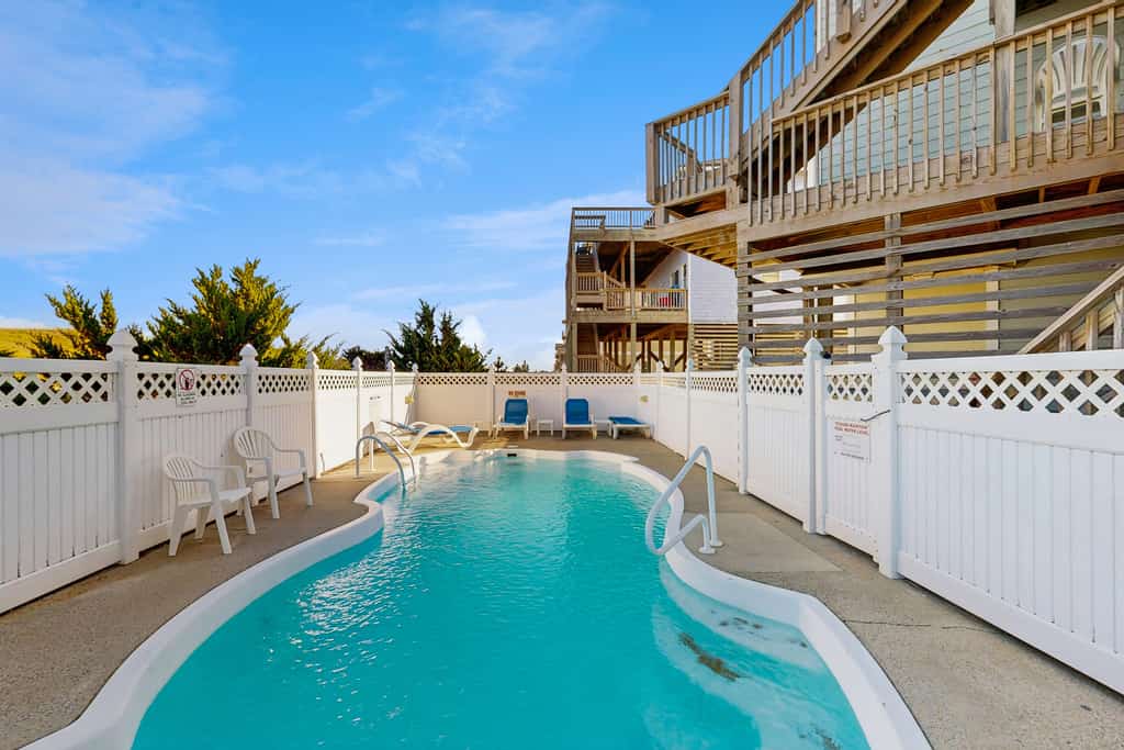 Oceanfront home with private hot tub, outdoor pool, fireplace, & game room