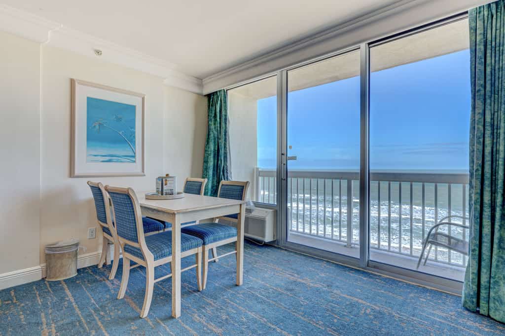 Resort-style oceanfront studio w/ pools, gym, and walkable beach access