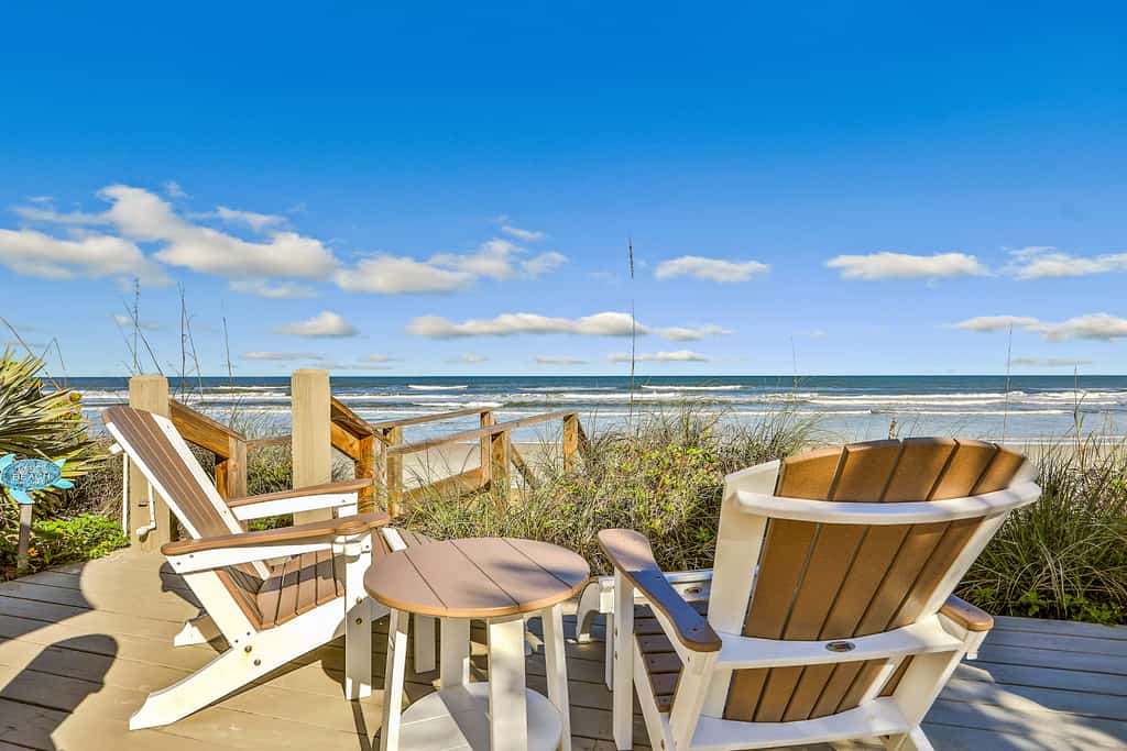 Oceanfront Escape w/ Deck, Shared Pool & Serene Non-Driving Beach