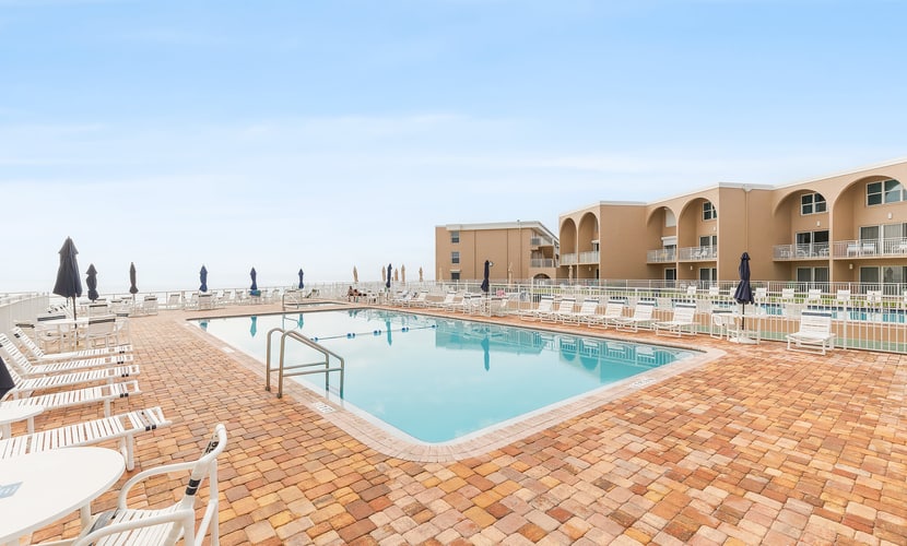Oceanfront Condo with Pool & Patio – Peaceful Beachside Vibes