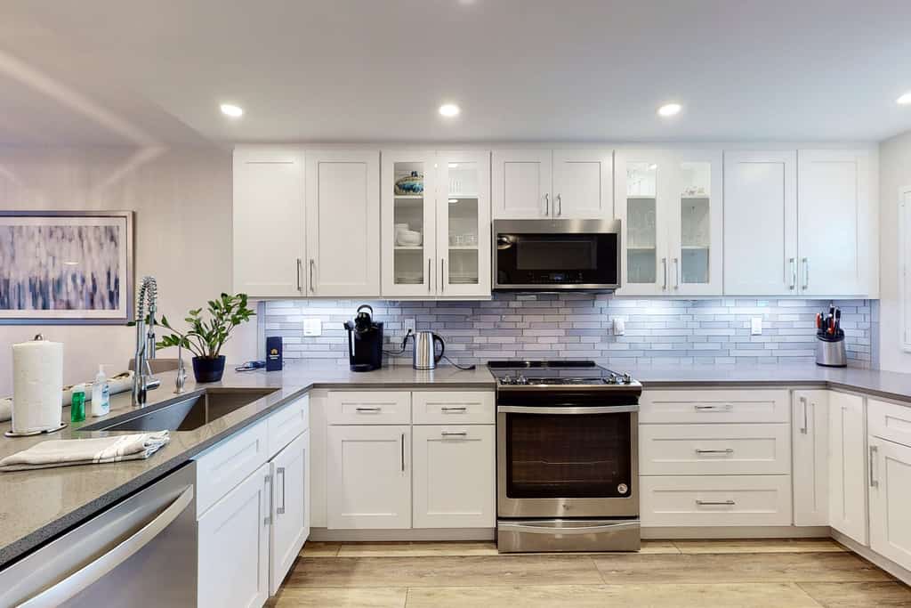 Modern Coastal Condo w/ Balcony, Pool & Easy Walk to the Beach