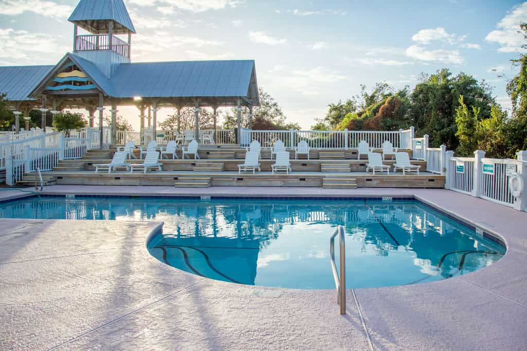 Charleston-style cottage w/ lovely decks, steps to the beach & pools
