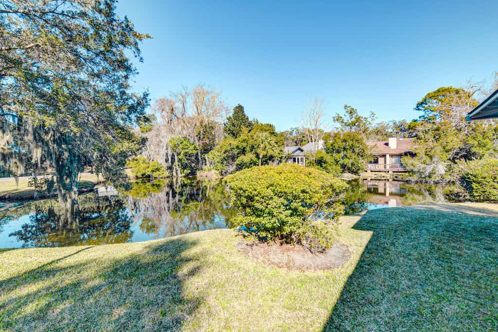 Sleek golf-front condo with a washer/dryer, deck, & central AC - dog friendly