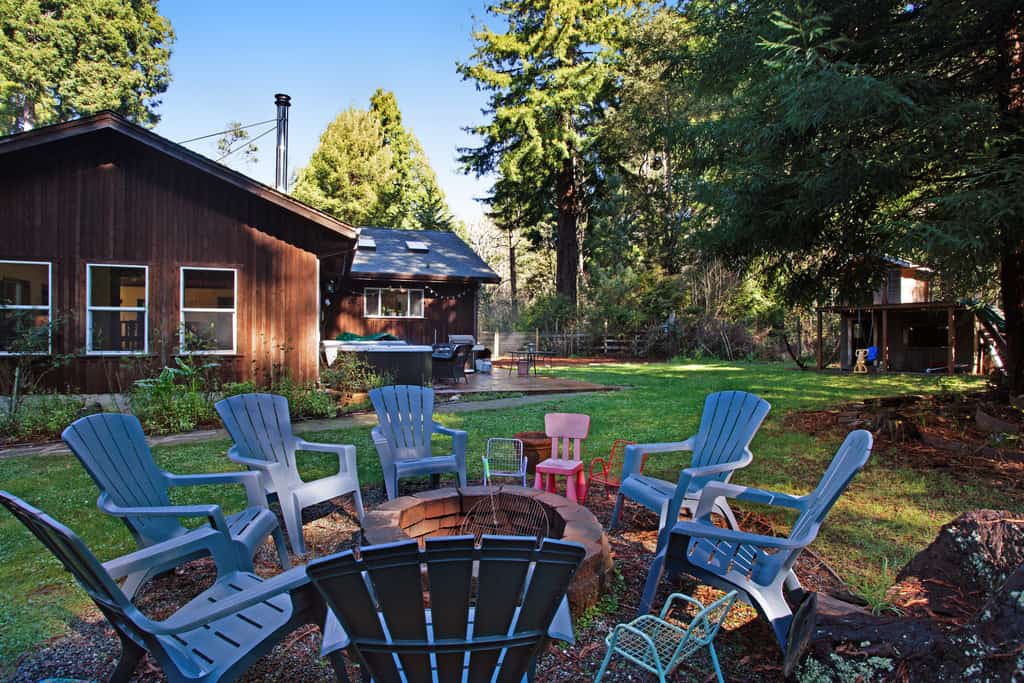 Fort Bragg Farmhouse
Indulge in a relaxing escape at this Fort Bragg home! Nestled on a spacious, tree-lined property, this retreat features a private hot tub, outdoor firepit, grill, and an expansive yard with a children's playhouse. Enjoy easy access to the beach for biking and coastal adventures. Your perfect family vacation awaits!