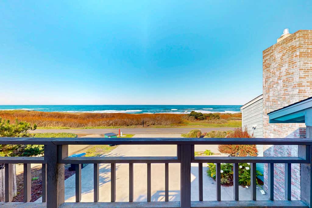 Sand Dollar Suite is an upstairs unit, attached to the main home. When arriving at the home, park on the right hand side of the driveway directly in front of the right side of the garage. Walk thru the gate on right side of home that says Sand Dollar. On your left will be a door with an e-lock, which is the entrance into the Sand Dollar suite. Once you are in the entryway, the right door leads up a flight of stairs into the Sand Dollar suite.
