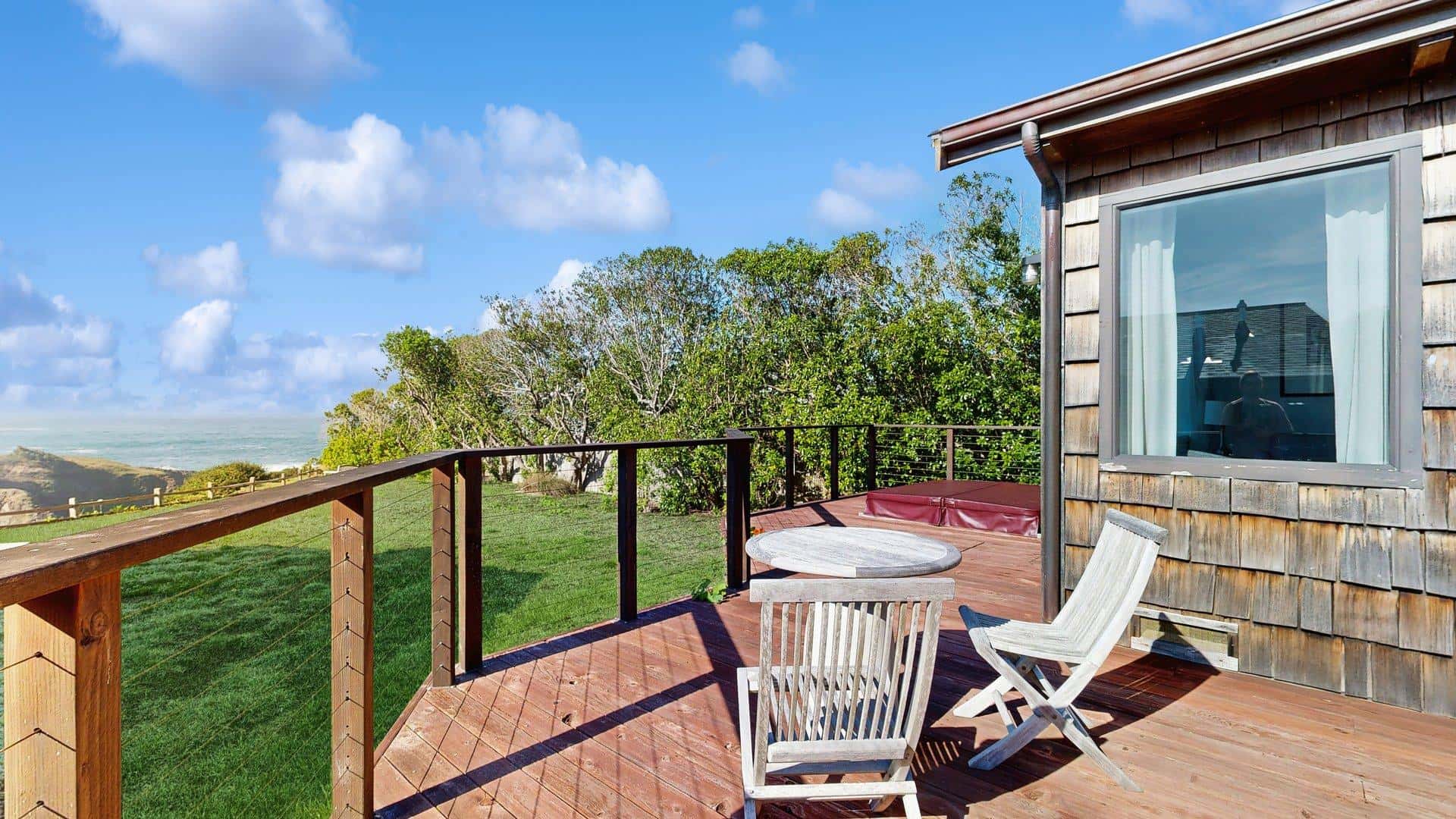 Oceanfront cottage with beach views & deck