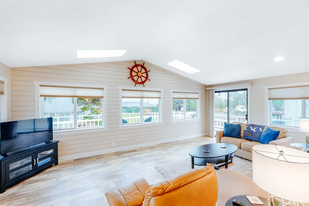 Homey dog friendly house with partial ocean views gas fireplaces and gas grill