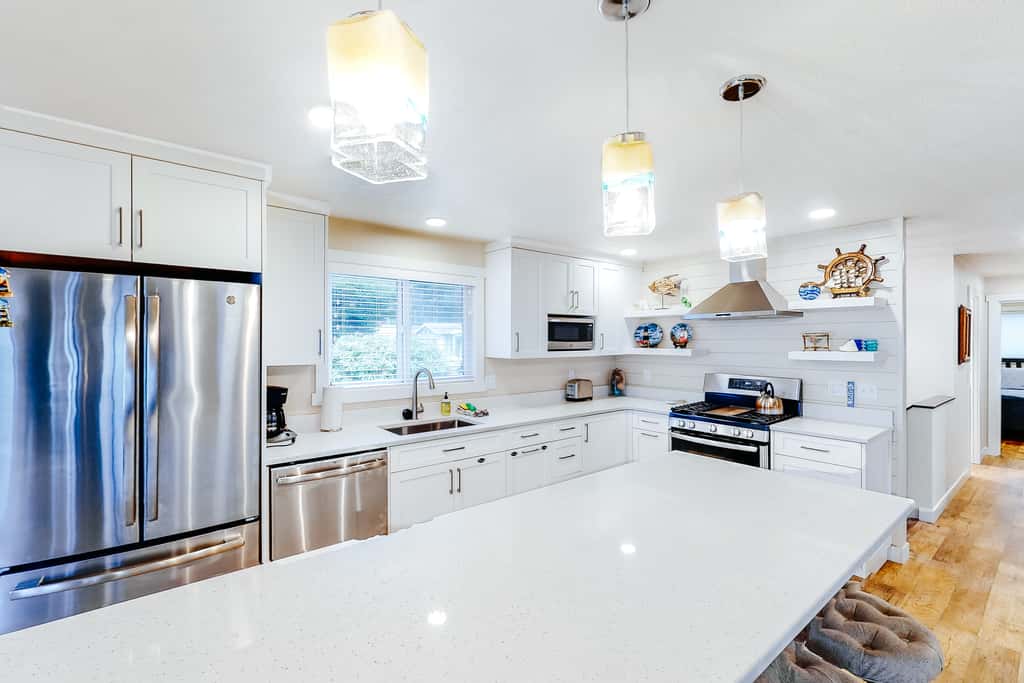 Homey dog friendly house with partial ocean views gas fireplaces and gas grill