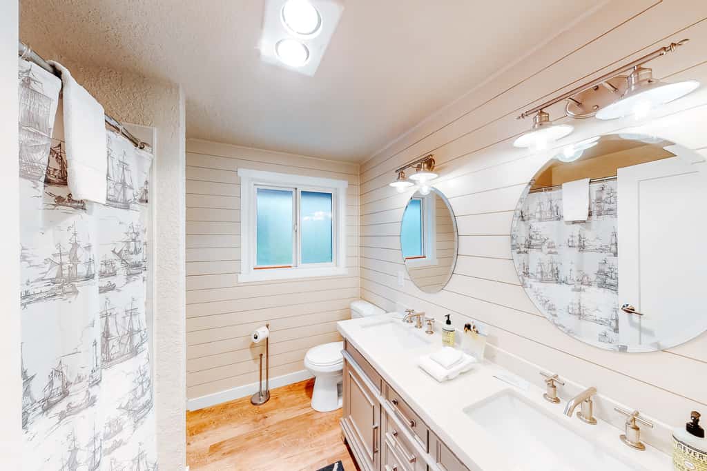 Homey dog friendly house with partial ocean views gas fireplaces and gas grill
