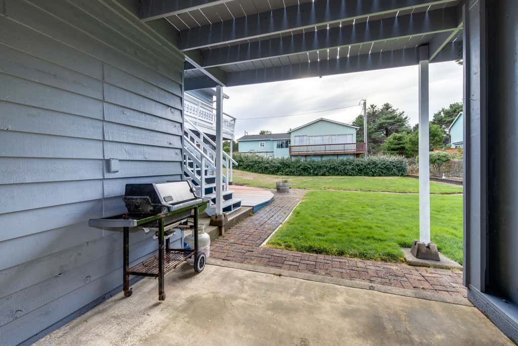 Homey dog friendly house with partial ocean views gas fireplaces and gas grill