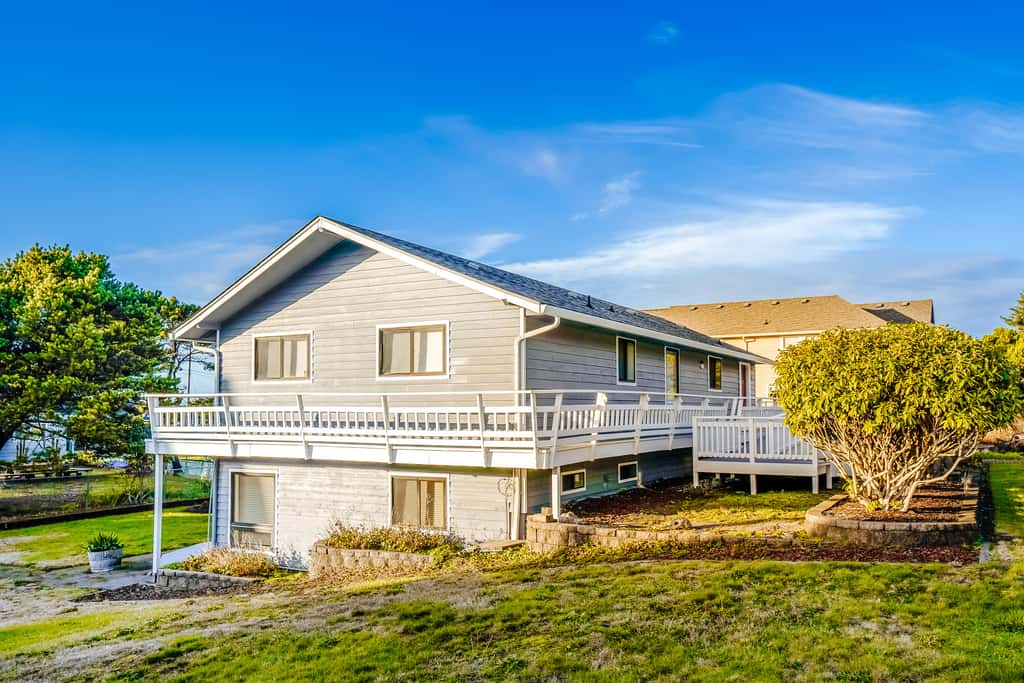 Homey dog friendly house with partial ocean views gas fireplaces and gas grill