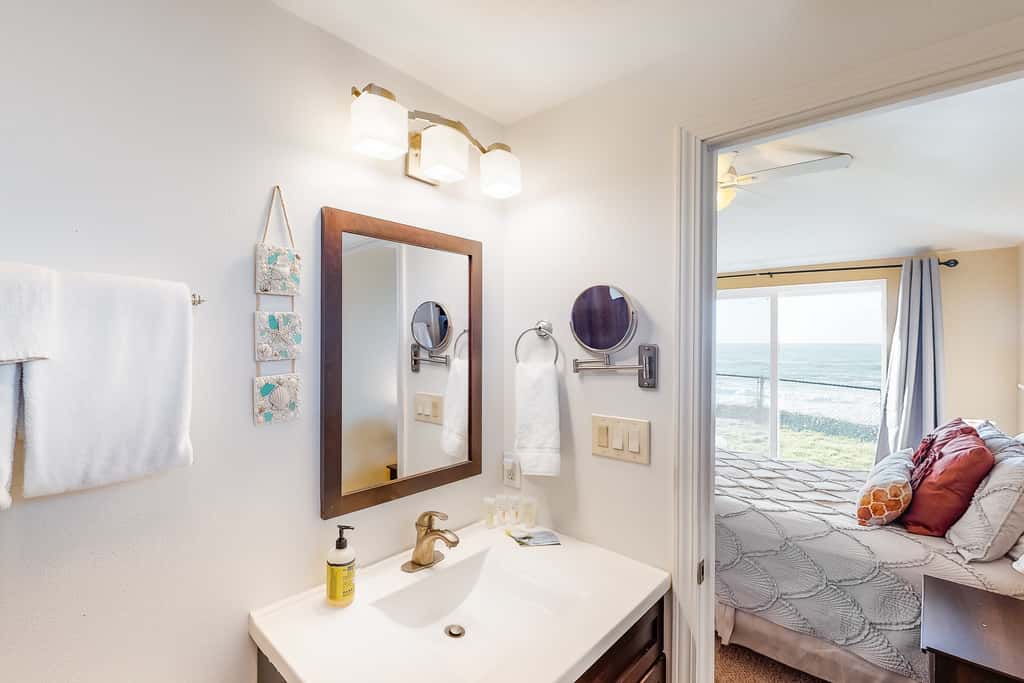 Oceanfront house steps to beach with private hot tub firepit and spectacular view