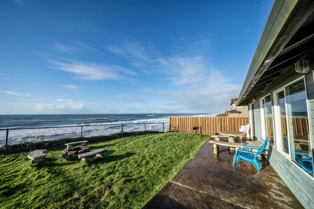Oceanfront house steps to beach with private hot tub firepit and spectacular view