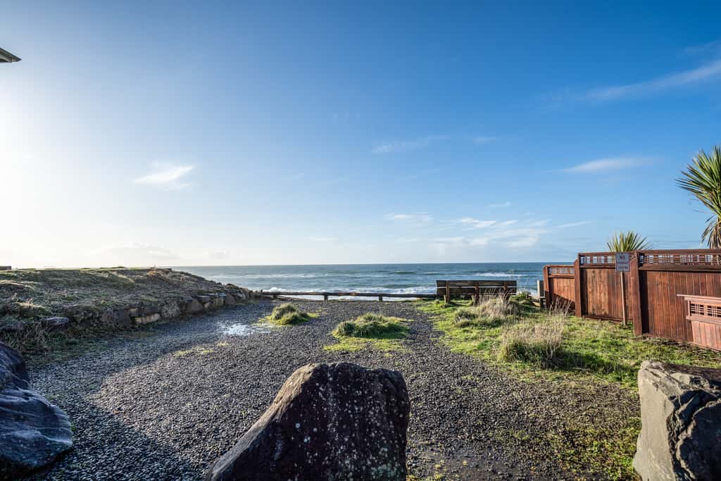 Oceanfront house steps to beach with private hot tub firepit and spectacular view