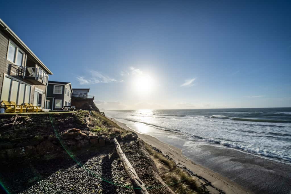 Oceanfront house steps to beach with private hot tub firepit and spectacular view