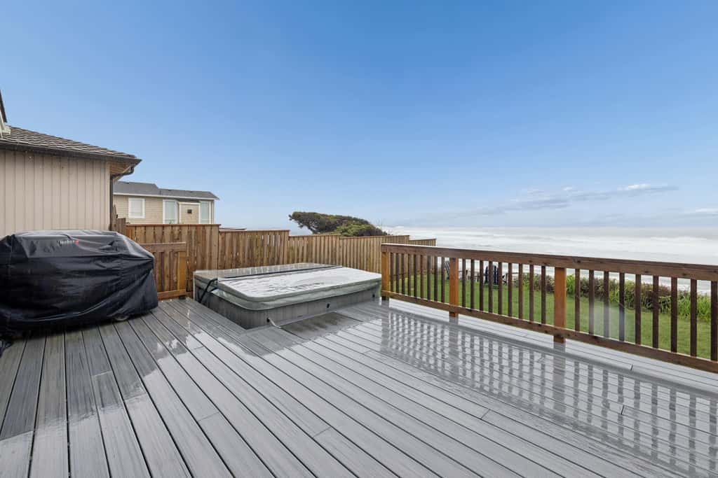 Oceanfront dog friendly house with deck private hot tub and stunning views