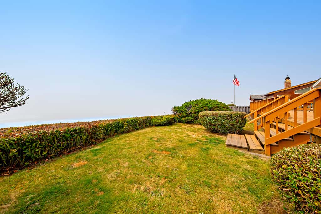 Oceanfront dog friendly house with deck private hot tub and stunning views