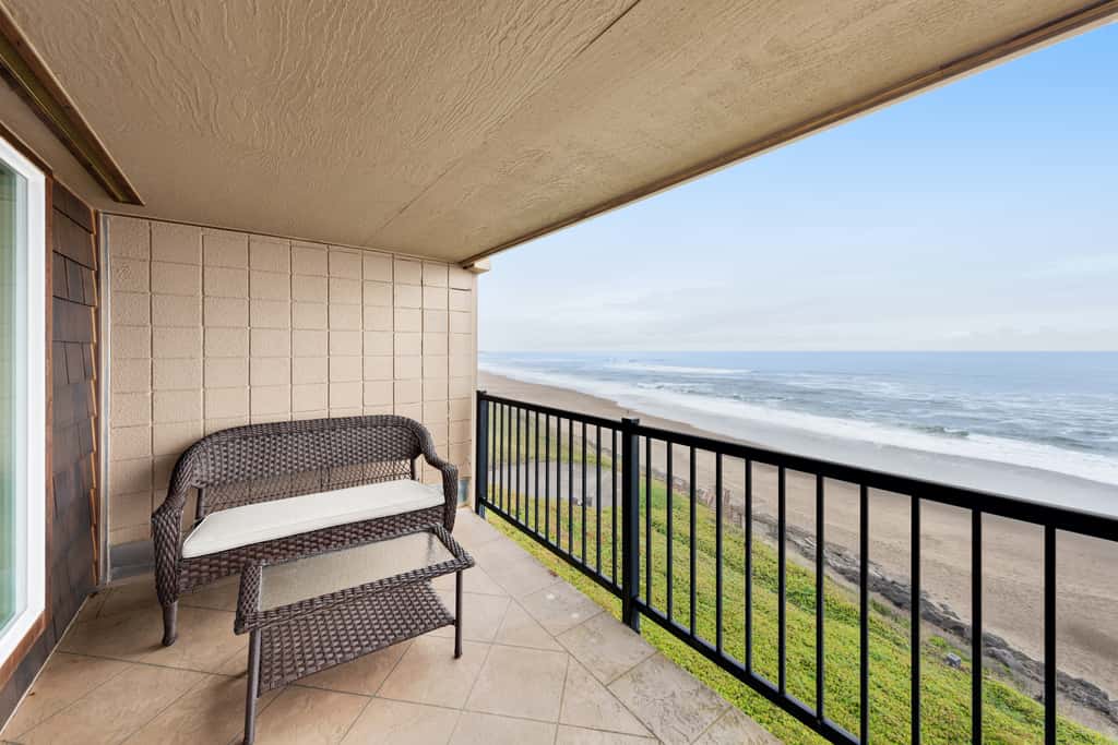 Lovely oceanfront condo with sweeping water views and balcony