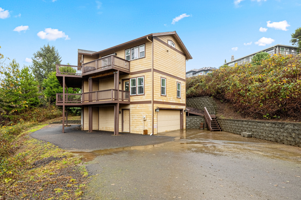 Three story ocean view home with balconies grill and open layout dog friendly