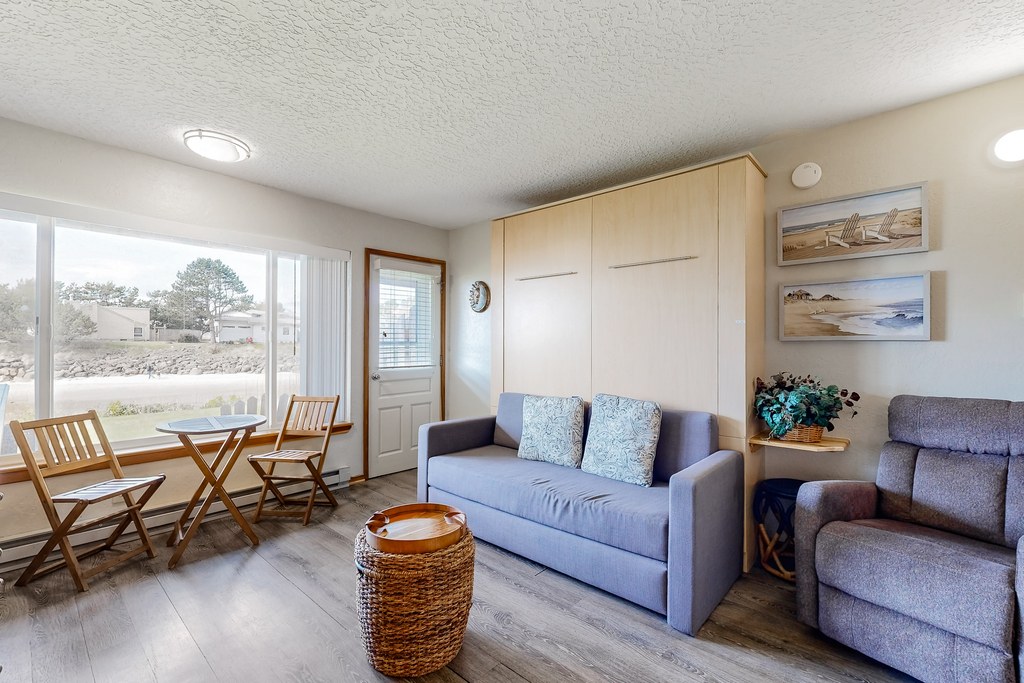 Beachfront dog friendly studio with amazing Proposal Rock view steps to the sand