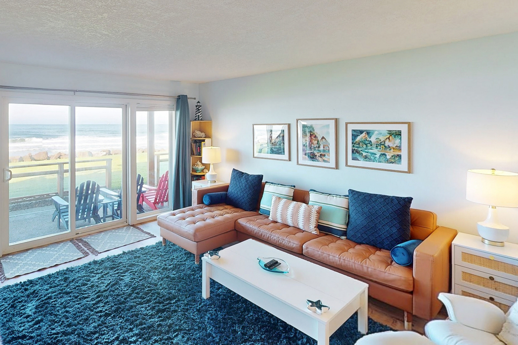 Beautiful ocean front condo with stunning views WiFi steps to beach