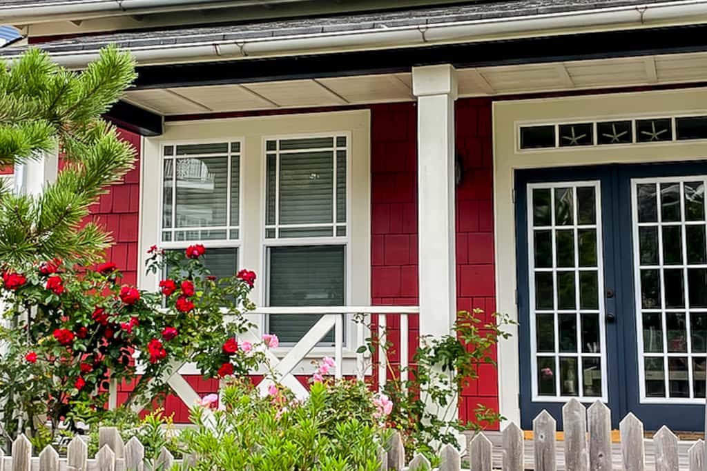 Romantic Oregon Coast Escape with Porch, Fireplace & Garden Charm