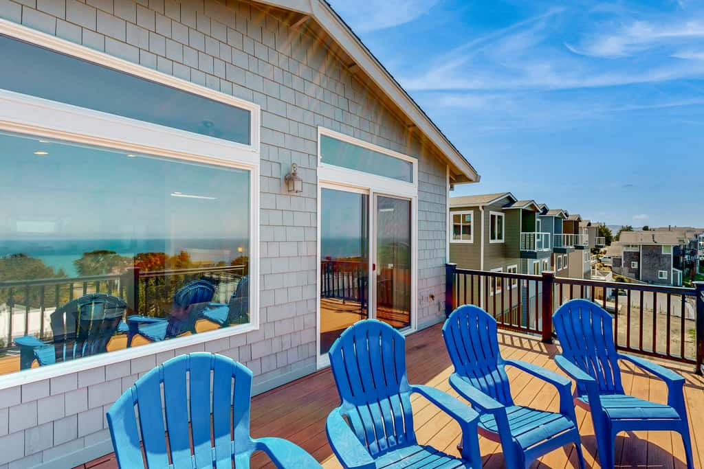 Sweeping ocean view home with fireplace grill and foosball table dog friendly