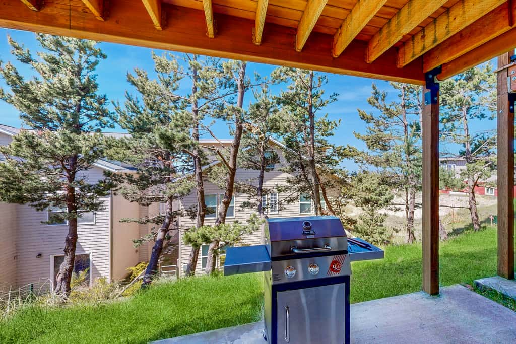 Sweeping ocean view home with fireplace grill and foosball table dog friendly