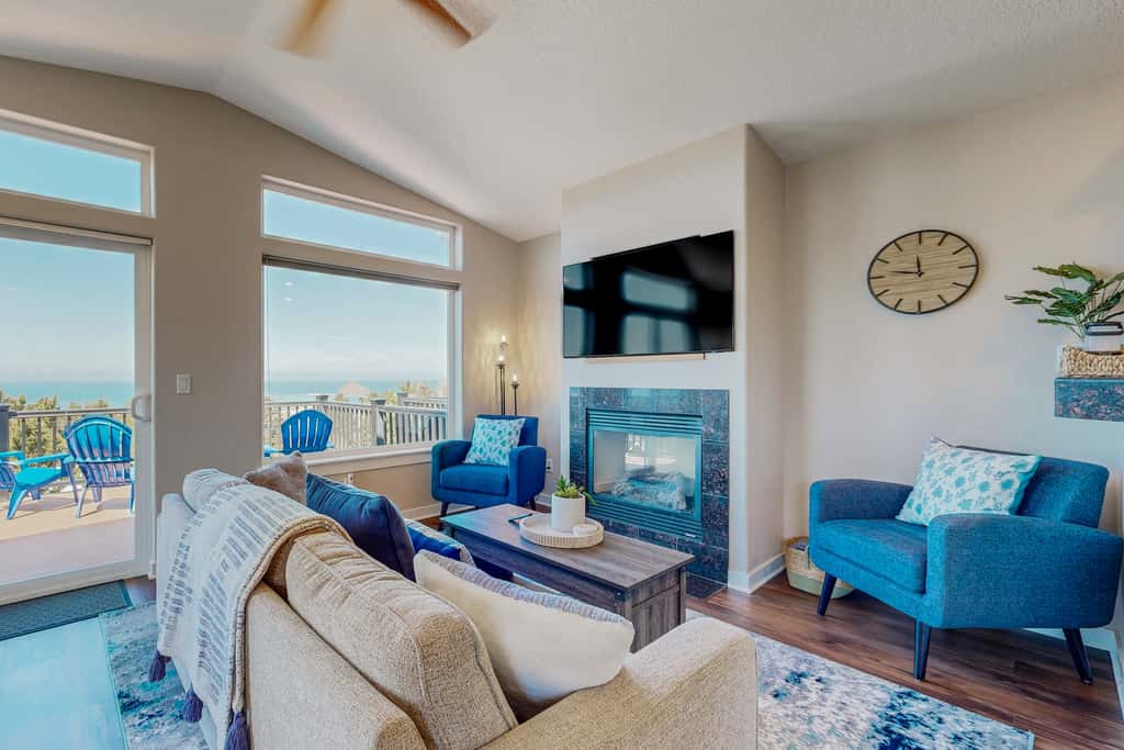 Sweeping ocean view home with fireplace grill and foosball table dog friendly