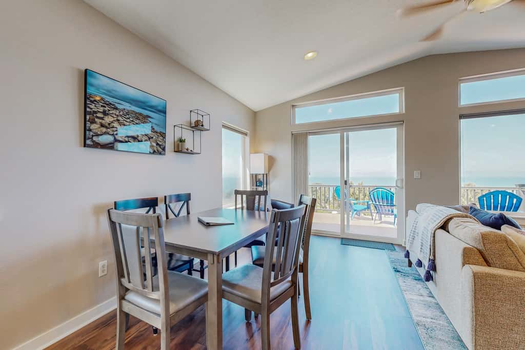 Sweeping ocean view home with fireplace grill and foosball table dog friendly