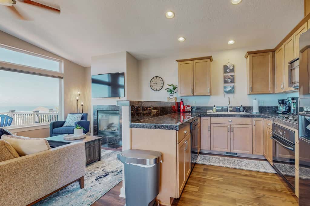 Sweeping ocean view home with fireplace grill and foosball table dog friendly