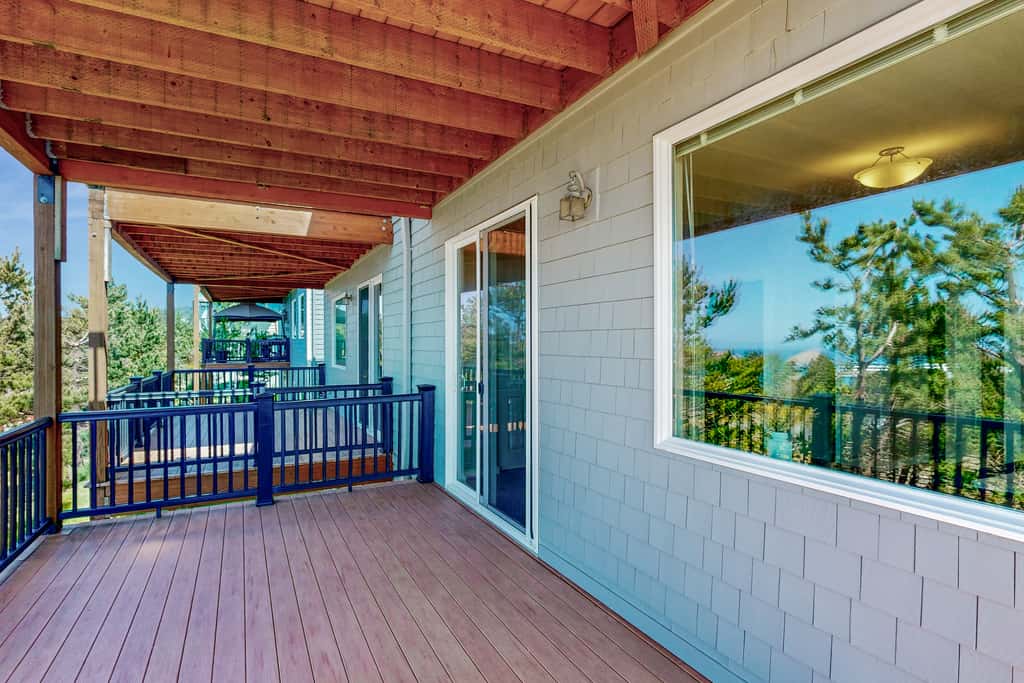 Sweeping ocean view home with fireplace grill and foosball table dog friendly
