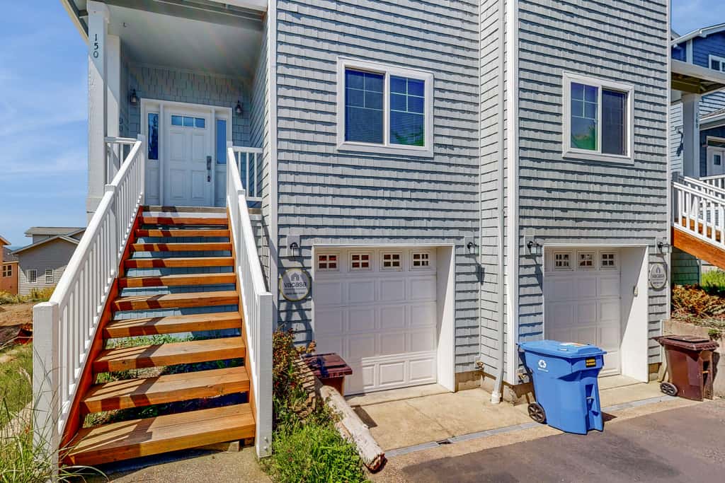 Sweeping ocean view home with fireplace grill and foosball table dog friendly