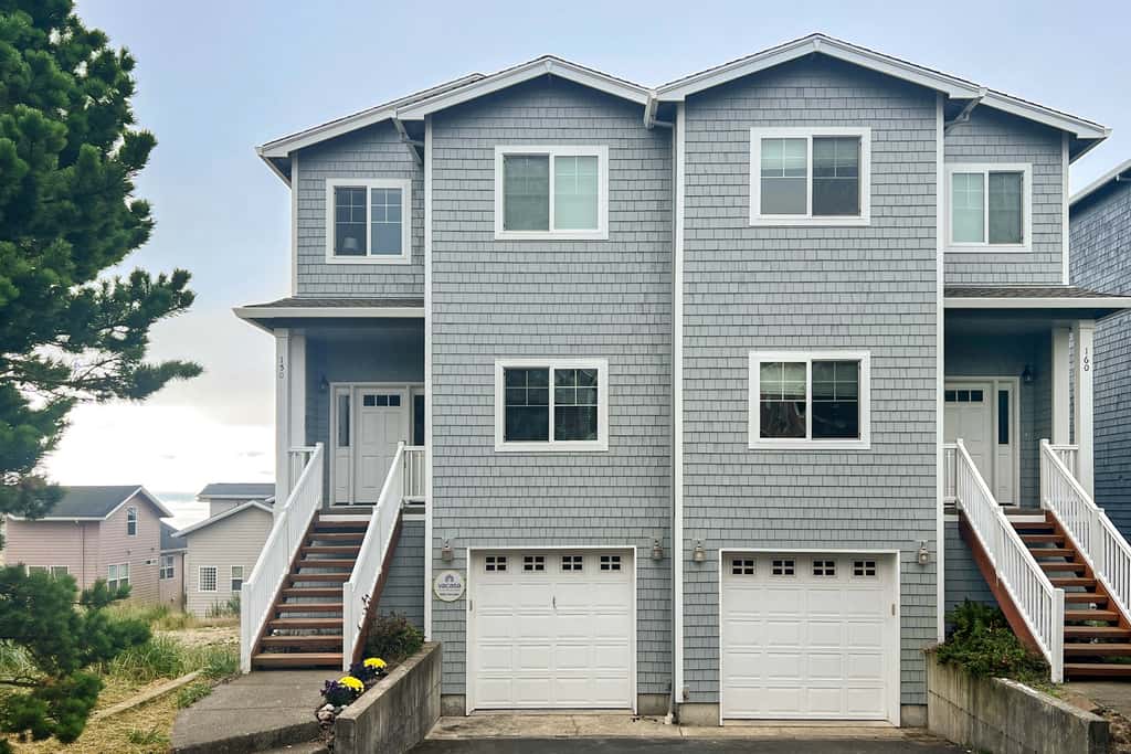 Sweeping ocean view home with fireplace grill and foosball table dog friendly